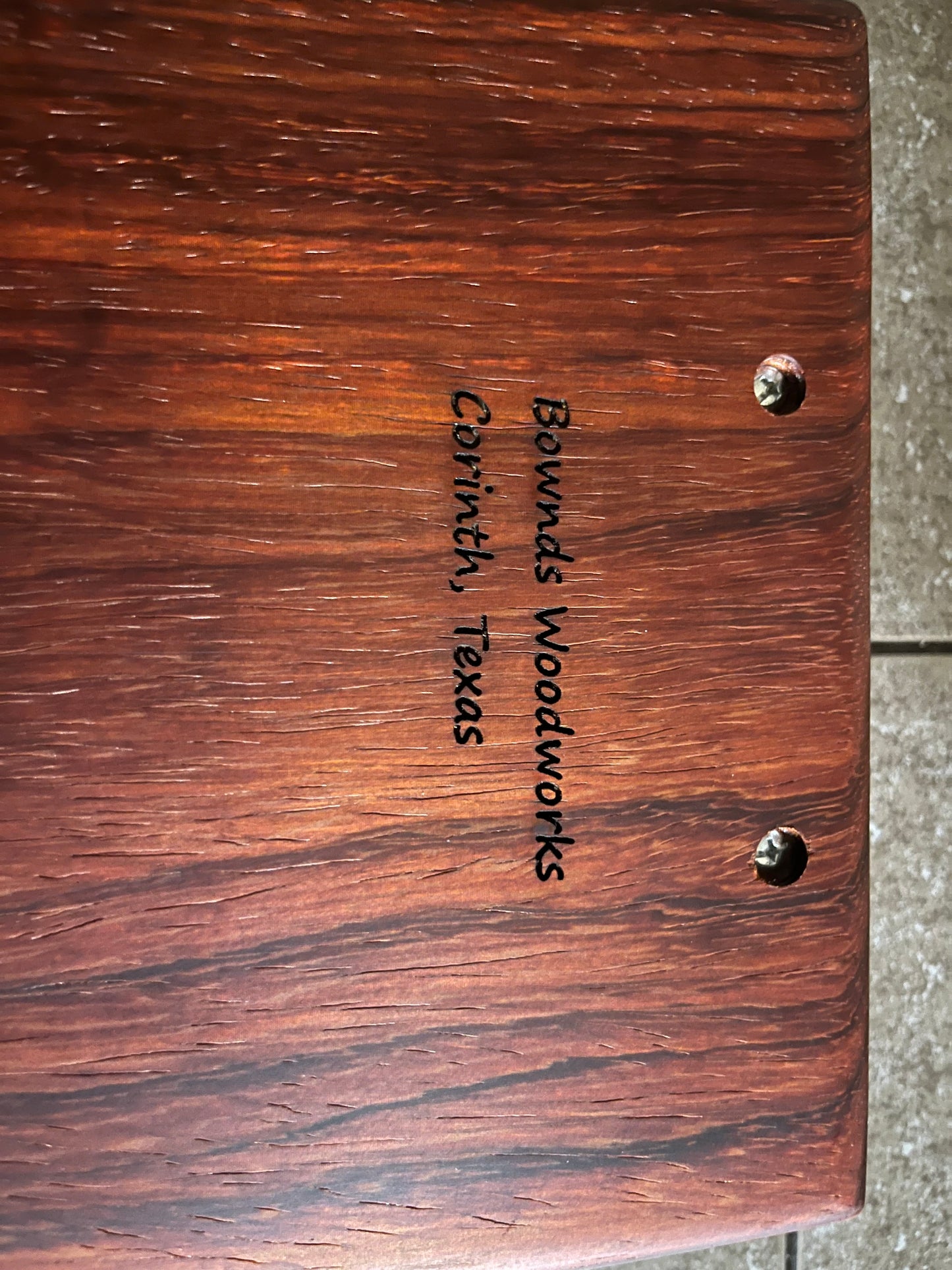 African Padauk 18-7/8" X 8-3/8" X 1" Serving Board w/black handles attached