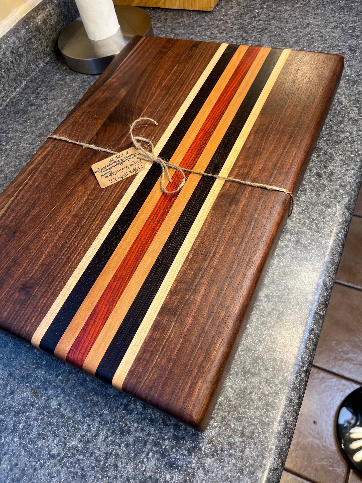 19-5/8"L X 13"W X 2"H Walnut edge grain cutting board with cherry, maple, African wenge & padauk accent strips.