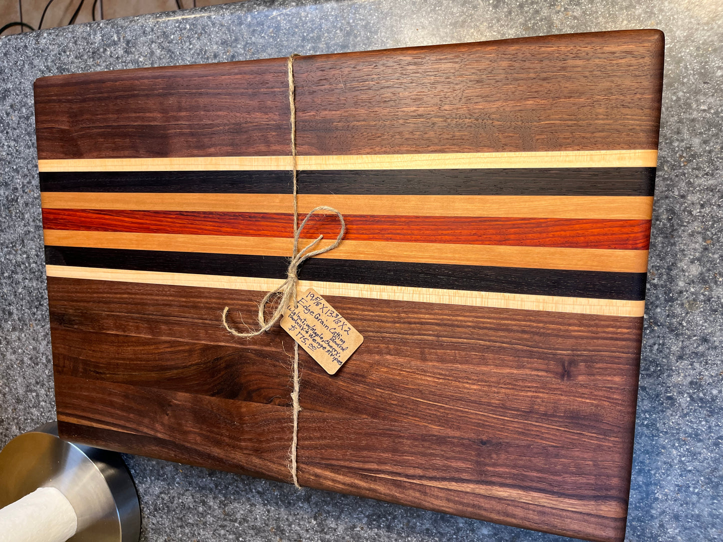 19-5/8"L X 13"W X 2"H Walnut edge grain cutting board with cherry, maple, African wenge & padauk accent strips.