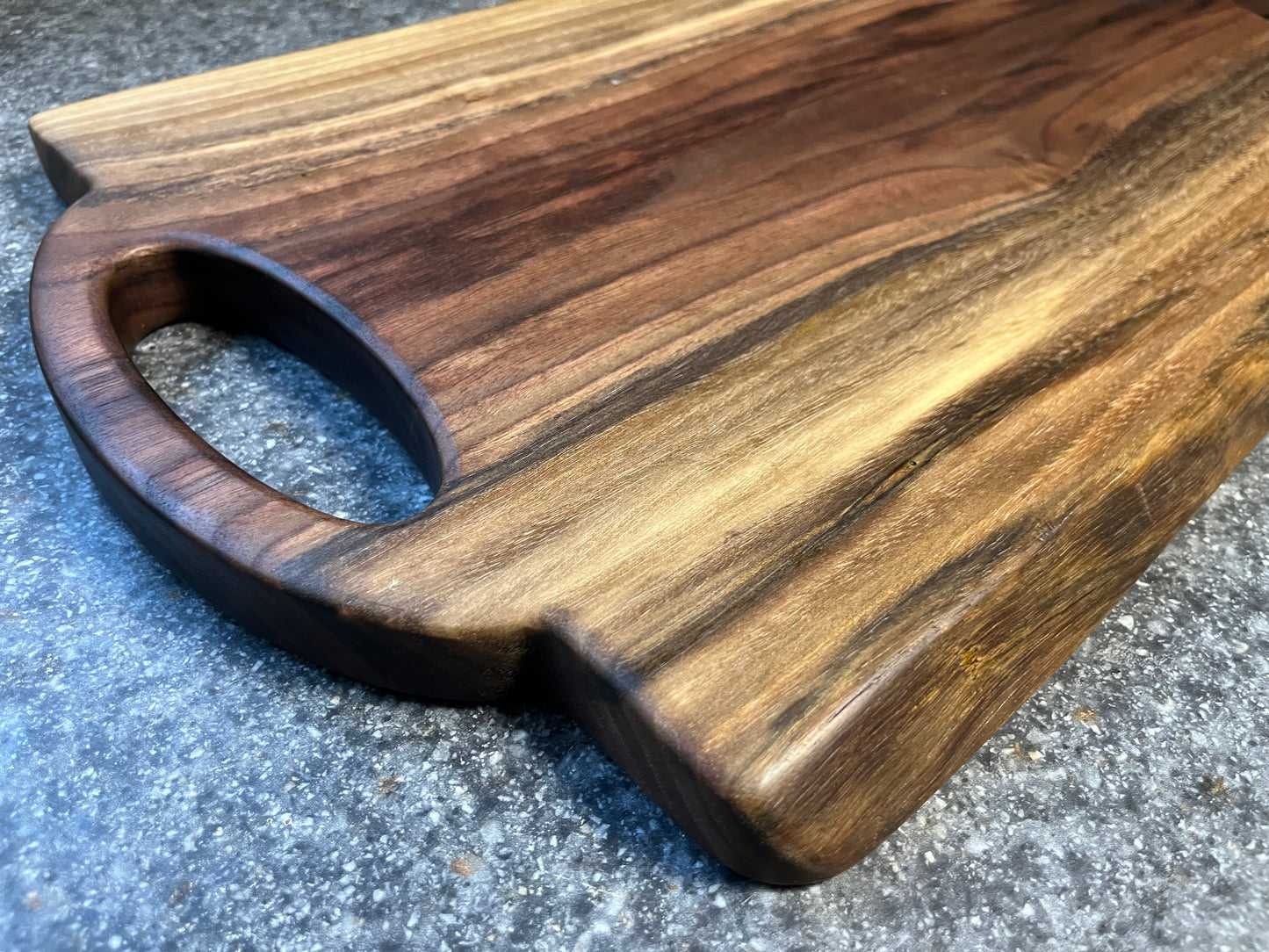 24-5/16"L X 12-1/4"W X 1"H Walnut Live Edge Charcuterie Serving Board