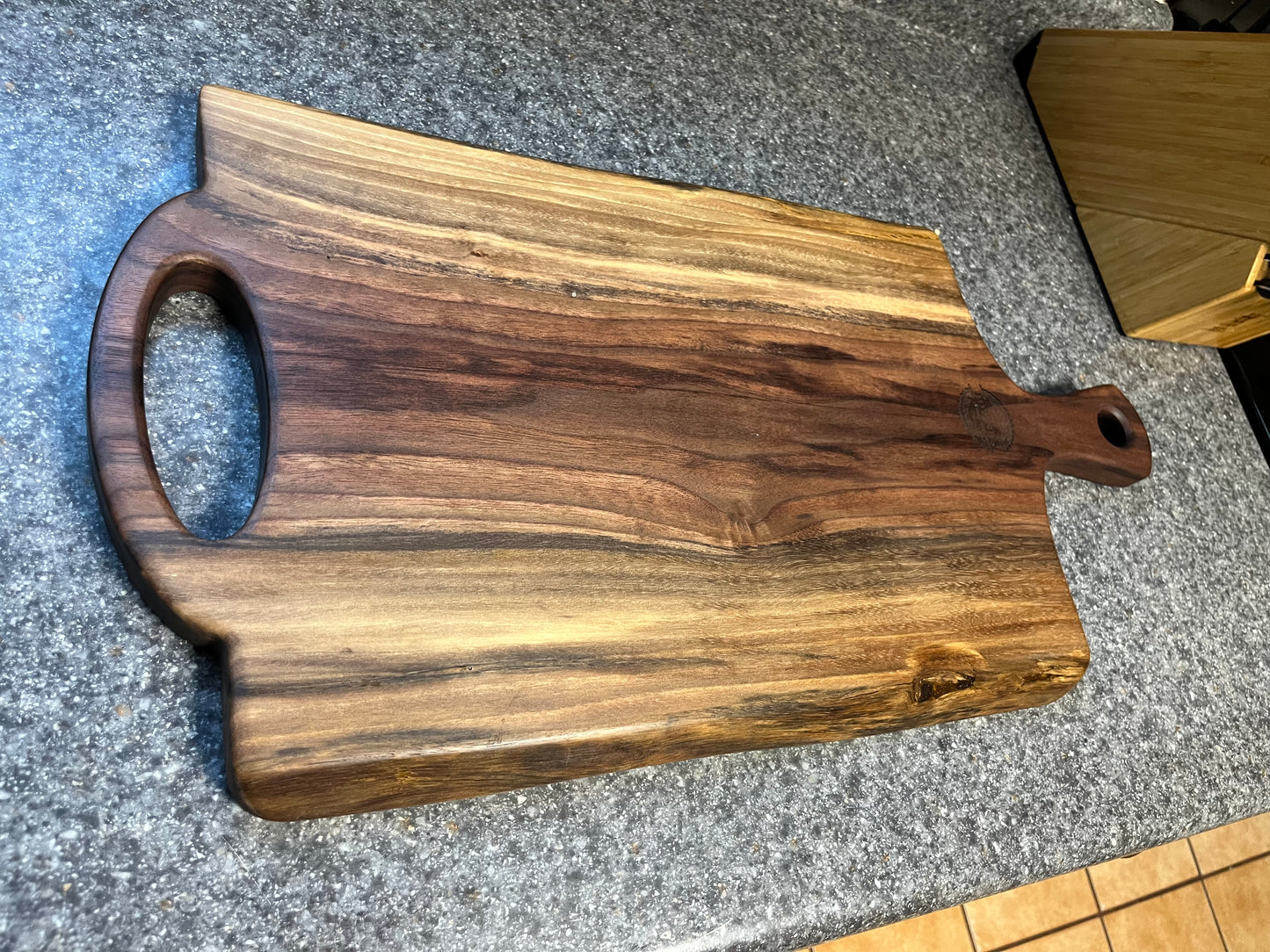 24-5/16"L X 12-1/4"W X 1"H Walnut Live Edge Charcuterie Serving Board