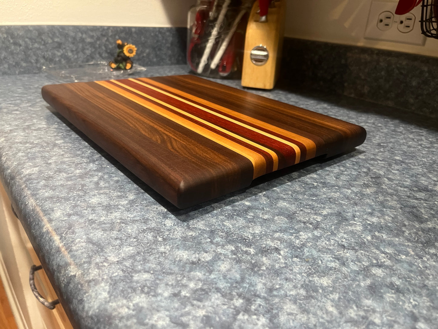 13-7/8"L X 10-1/4"W X 1"H Edge Grain Walnut Cutting Board with Cherry, Maple, Padauk accent strips