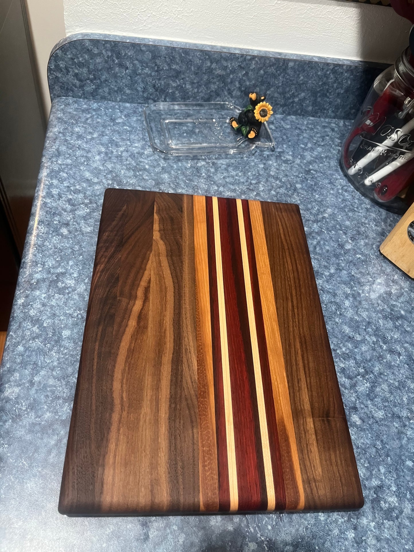 13-7/8"L X 9-7/8"W X 1"H Edge Grain Walnut Cutting Board with Cherry, Maple, Padauk accent strips