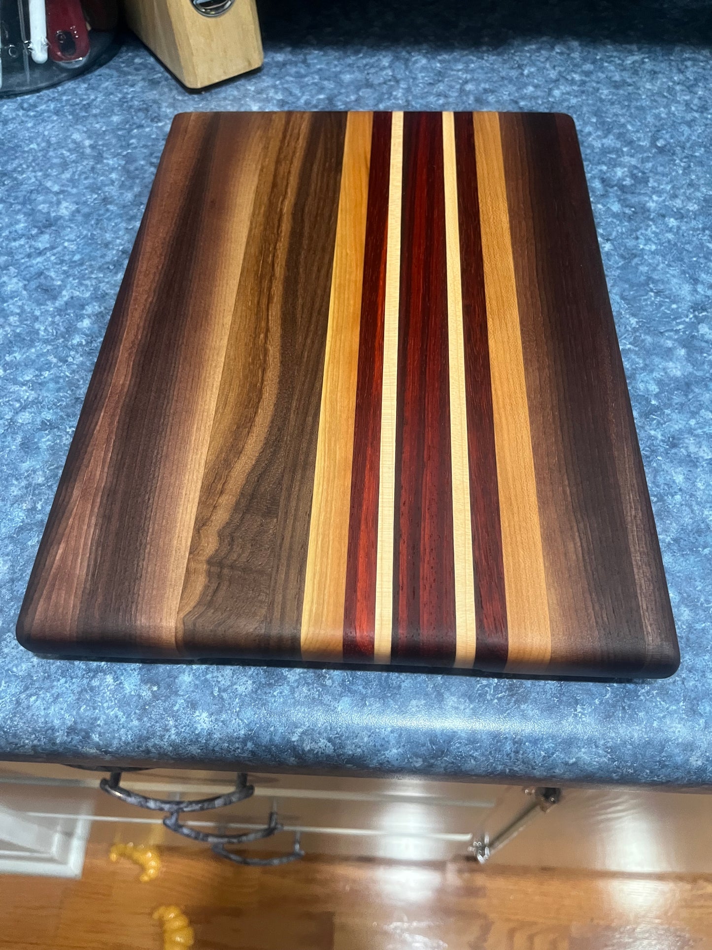 13-7/8"L X 10"W X 1"H Edge Grain Walnut Cutting Board with Cherry, Maple, Padauk accent strips