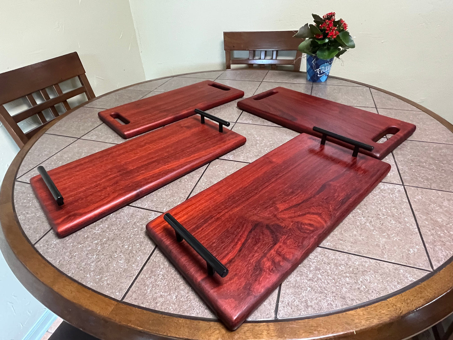 African Padauk 18"X 8-1/2" X 7/8" Serving Board w/black handles attached