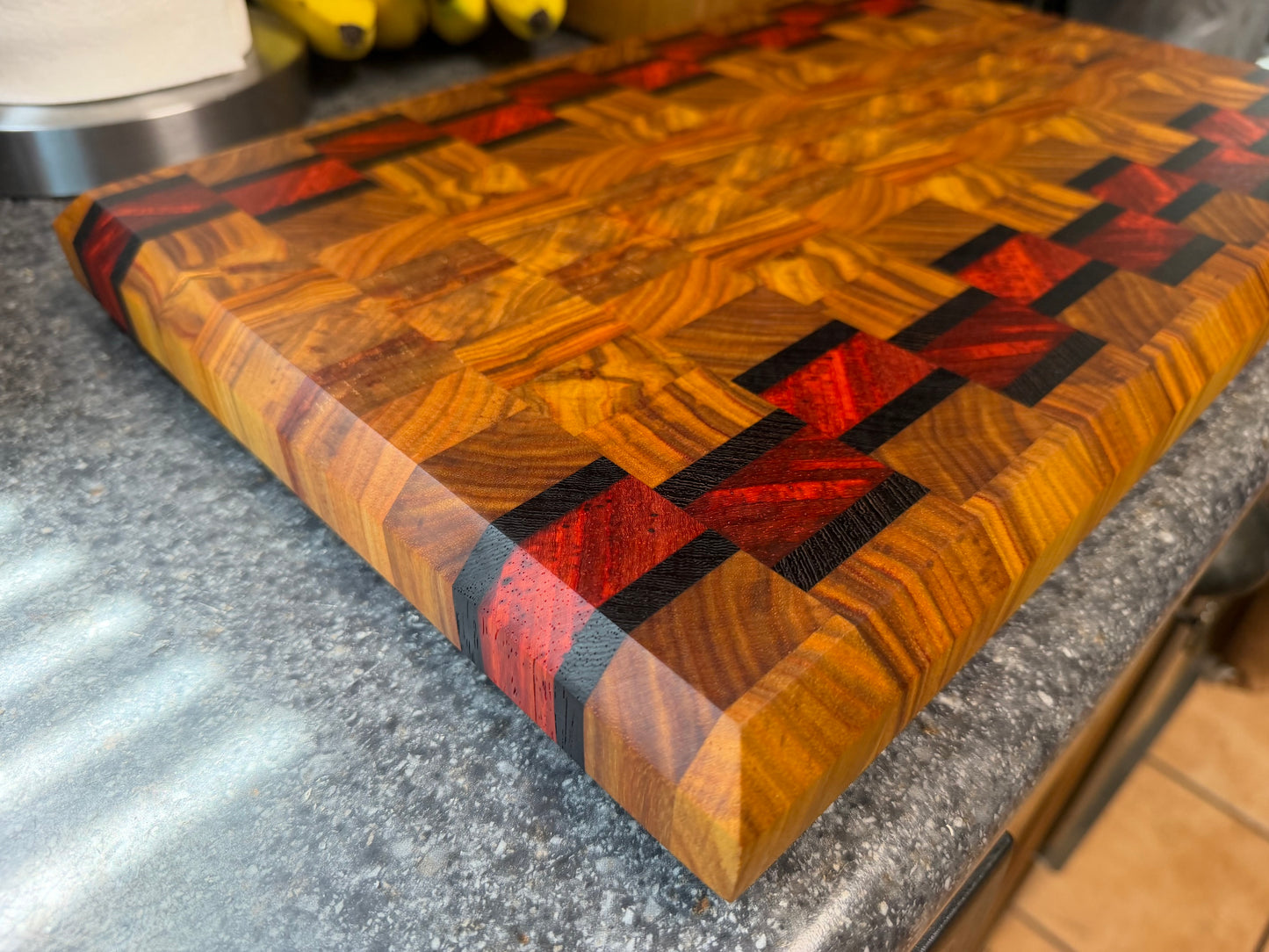 17-7/8"X11-3/4”X1-5/8” Canarywood w/Padauk & Wenge end grain cutting board -with beveled edges.