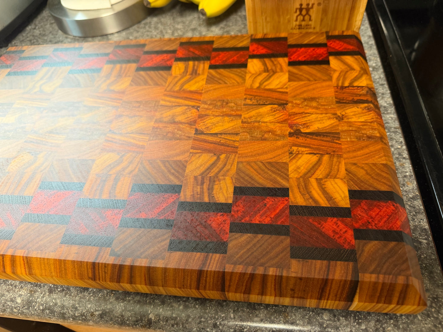 17-7/8"X11-3/4”X1-5/8” Canarywood w/Padauk & Wenge end grain cutting board -with beveled edges.