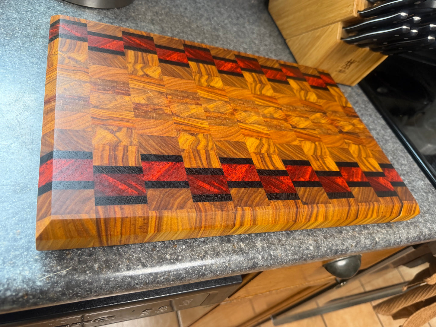 17-7/8"X11-3/4”X1-5/8” Canarywood w/Padauk & Wenge end grain cutting board -with beveled edges.
