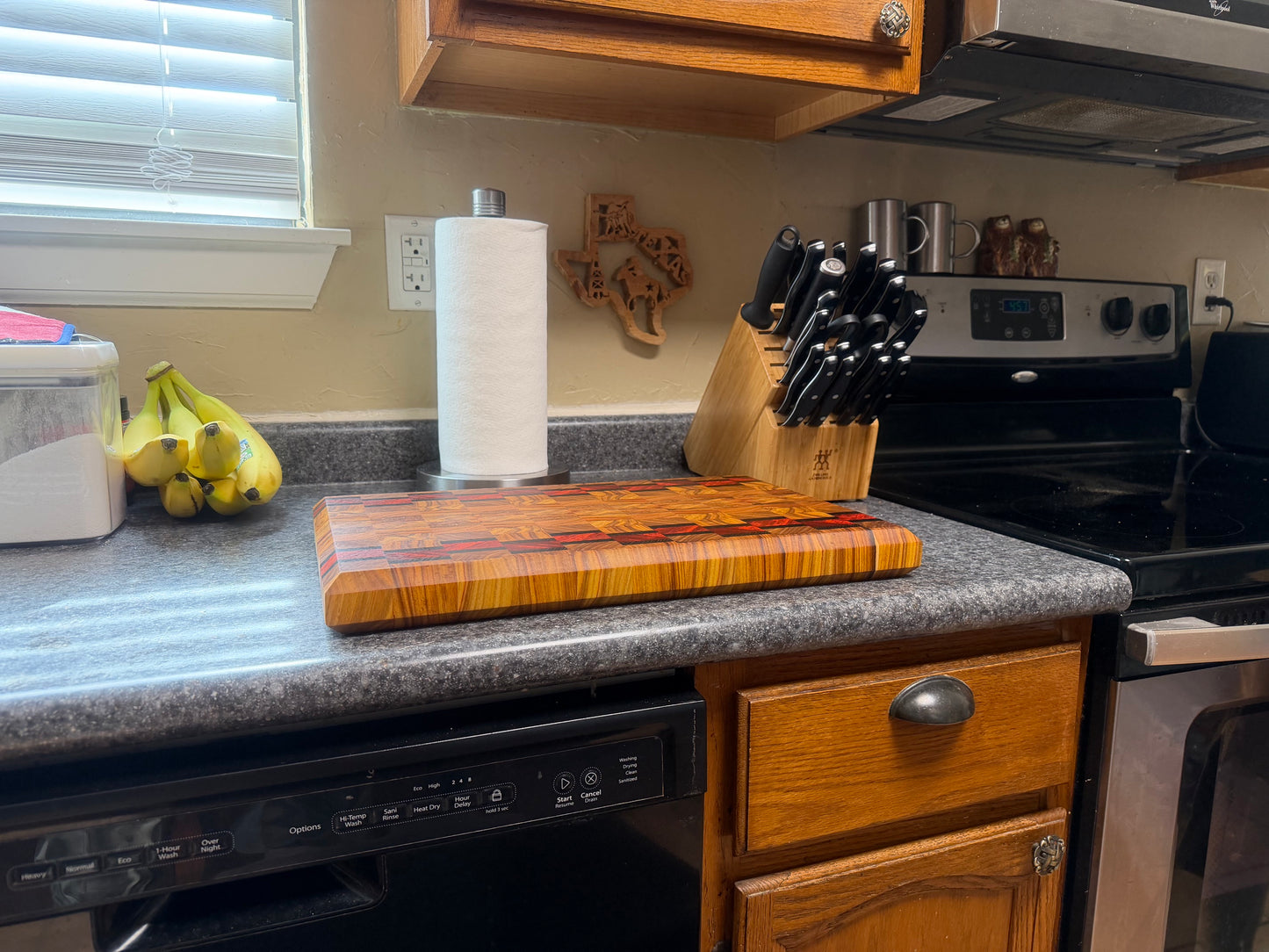 17-7/8"X11-3/4”X1-5/8” Canarywood w/Padauk & Wenge end grain cutting board -with beveled edges.