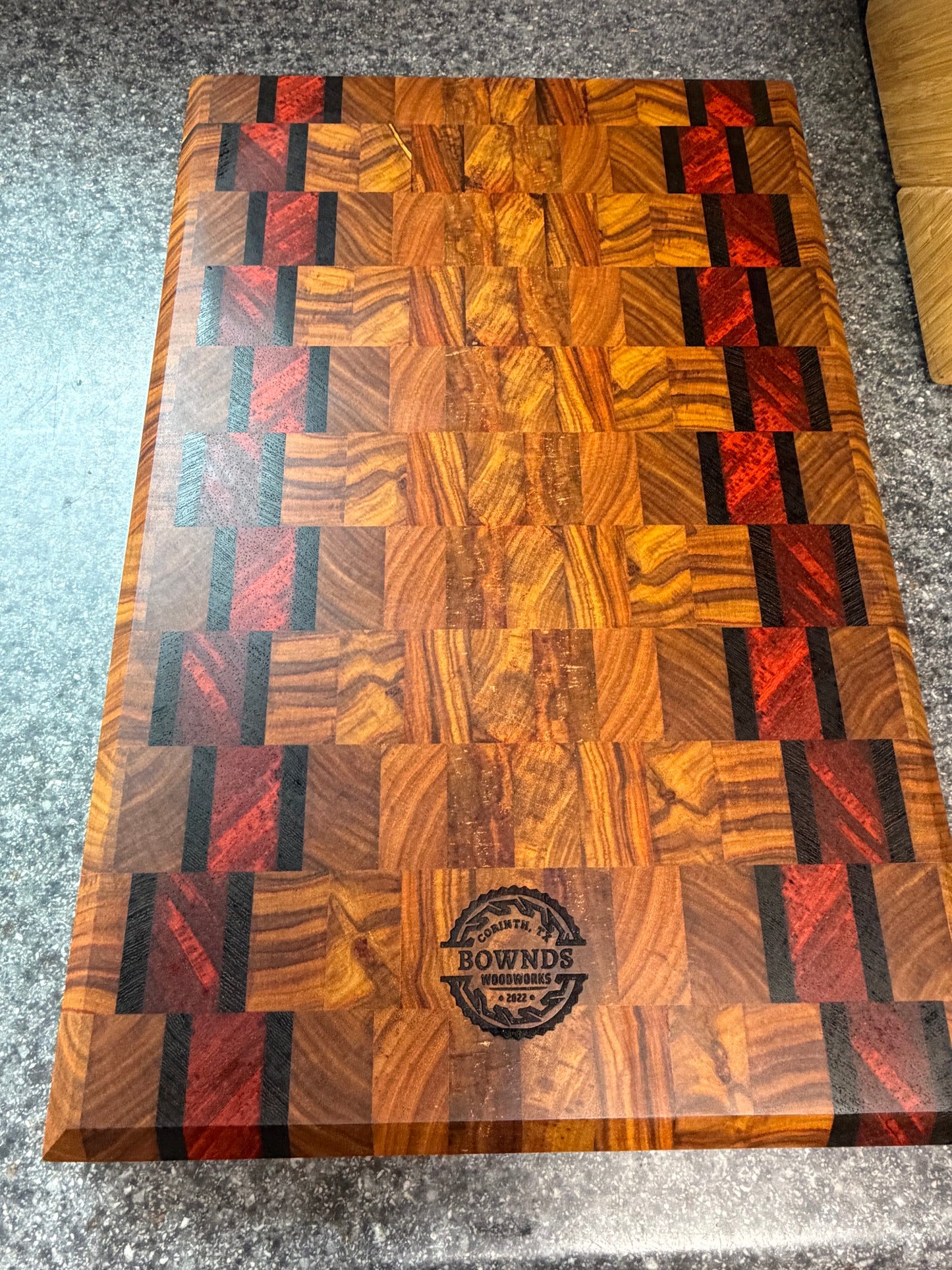 17-7/8"X11-3/4”X1-5/8” Canarywood w/Padauk & Wenge end grain cutting board -with beveled edges.
